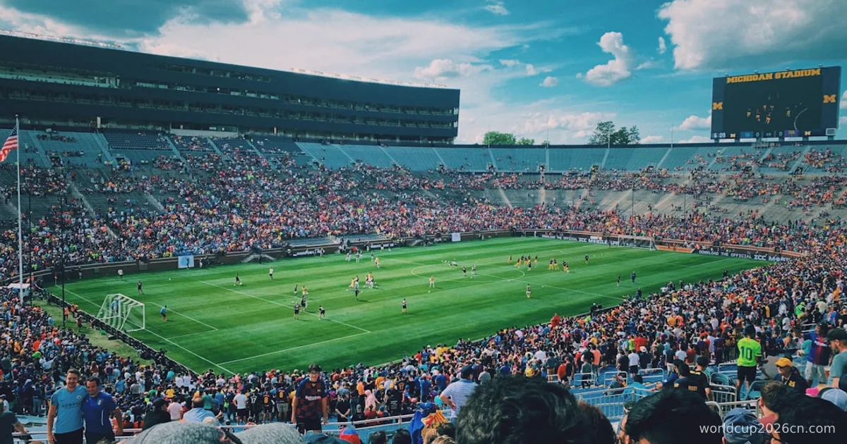 people watching football game during daytime